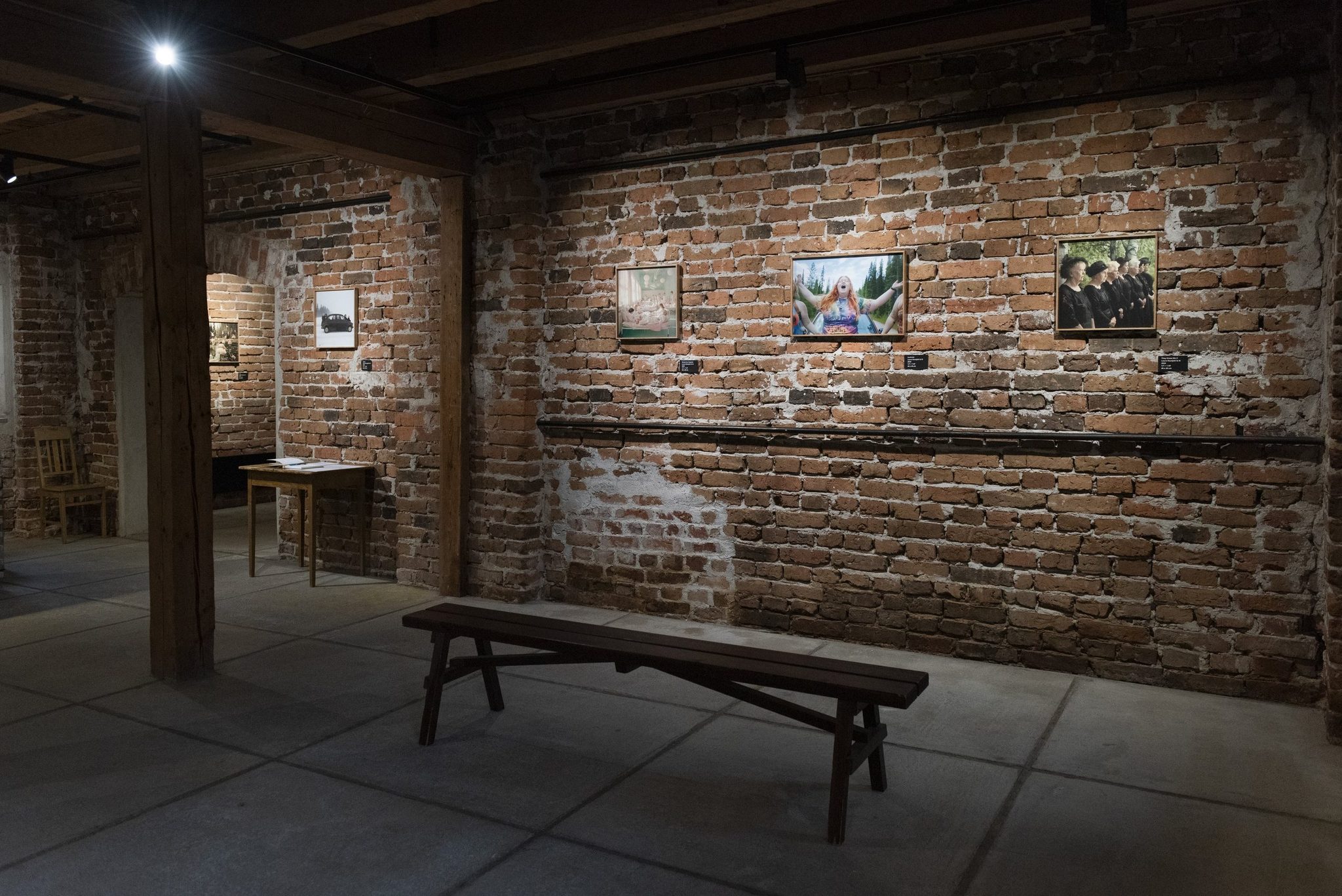 Installation view of Laura Rautjoki's exhibition in a brick-walled gallery